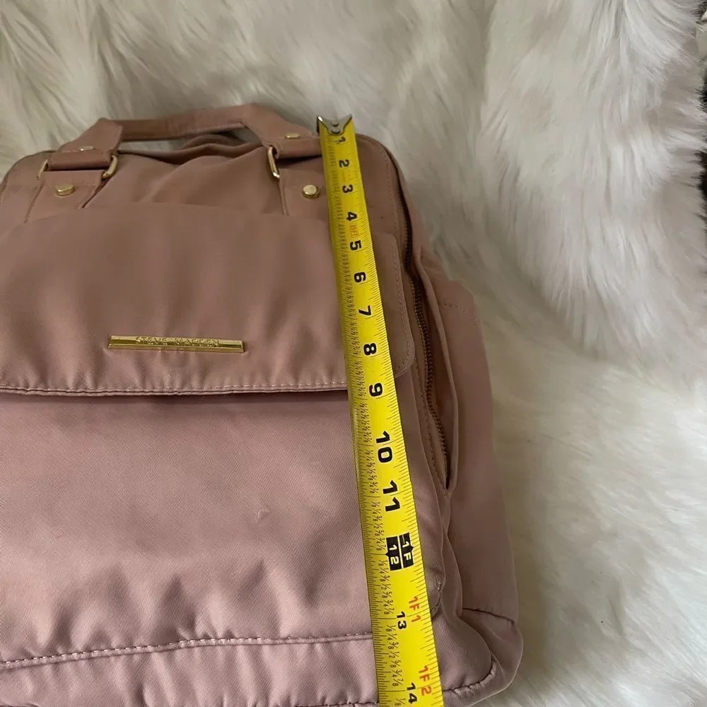 Steve Madden Nylon blush pink backpack with black embroidery back straps.